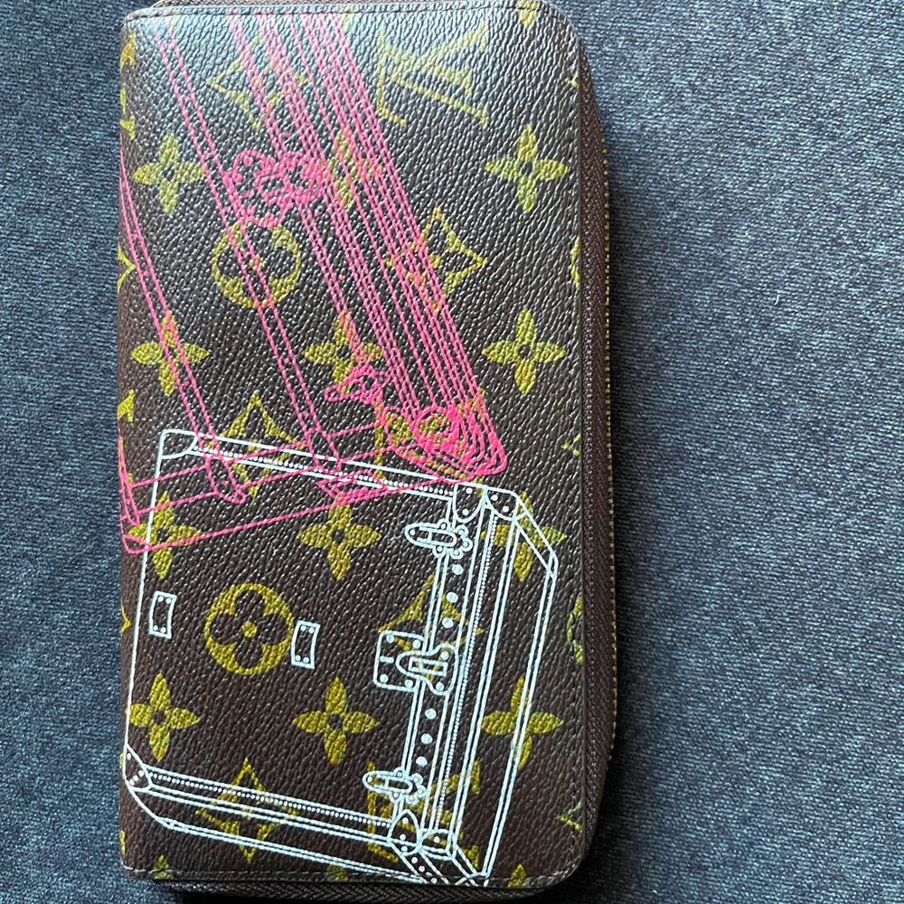 Woman’s Luis Vuitton Purse